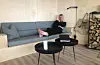 Magne Kydland slappar av i sofaen.