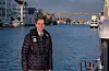 Den ferske sjøfartsdirektøren Knut Arild Hareide i maritime omgivnader ved Smedasundet i Haugesund, der Sjøfartsdirektoratet har hovudkontoret sitt. Foto: Marit Nilsen, Sjøfartsdirektoratet