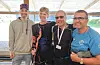 Skyttarar frå Haugesund og Sveio Skyttarlag etter lagskytinga. Frå venstre: Brynjar og Olve Birkeland, Svein Terje Ohm og Halvar Sævareid.