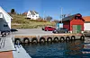 På Våga kan turistane finna overnattingsplass ved den kommunale kaien, og få tilgang til straum og vatn hos Helge Elias Tveit. FOTO: EINAR VESTVIK