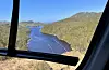 Eit bilete teken frå helikopteret av eit vatn i Sveio.FOTO: JOSTEIN BAKKE