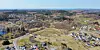 Dronefoto sentrum fjellstad bømlafjorden19. april 2021