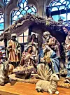 Ei julekrybbe i Bath Abbey i England. I år er det 800 år sidan den første julekrybba som tablå vart sett opp.