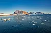 Isbreforskar Thomas V. Schuler har målt ein av breane som kalvar ut i Kongsfjorden ved Ny-Ålesund på Svalbard. Biletet av smeltande is i Kongsfjorden vart teke i 2018. Foto: Are Føli / NTB / NPK