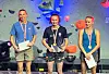 Sunniva Eik Haave, Ingrid Kindlihagen og Pernille Tvedt med NM-medaljar og premiar framfor ein klatrevegg.